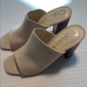 Calvin Klein Cream Mules with Minimalist Design